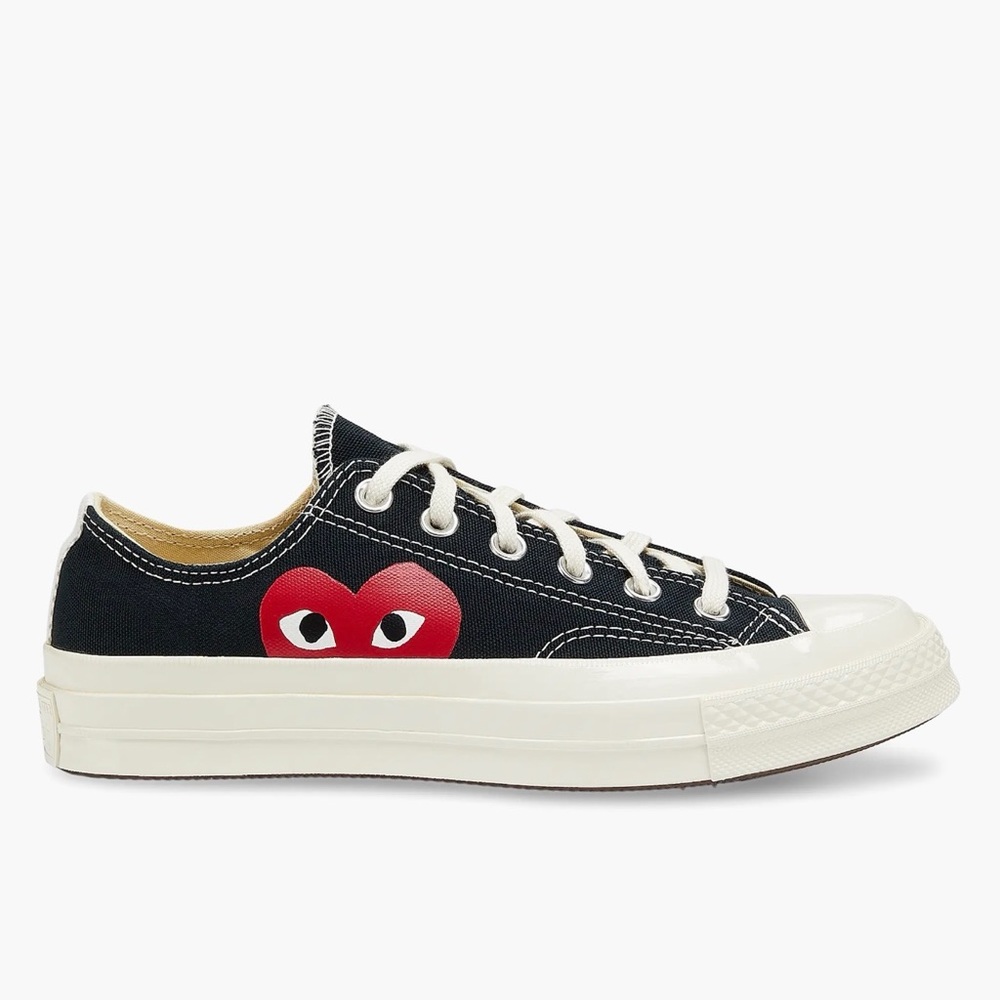 Converse Comme des Garçons PLAY Chuck
Taylor Low Tops men’s 7 women’s 9